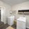 Washer and dryer with built-in shelves